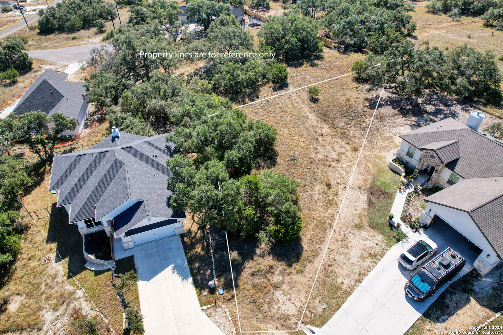 an aerial view of house with yard