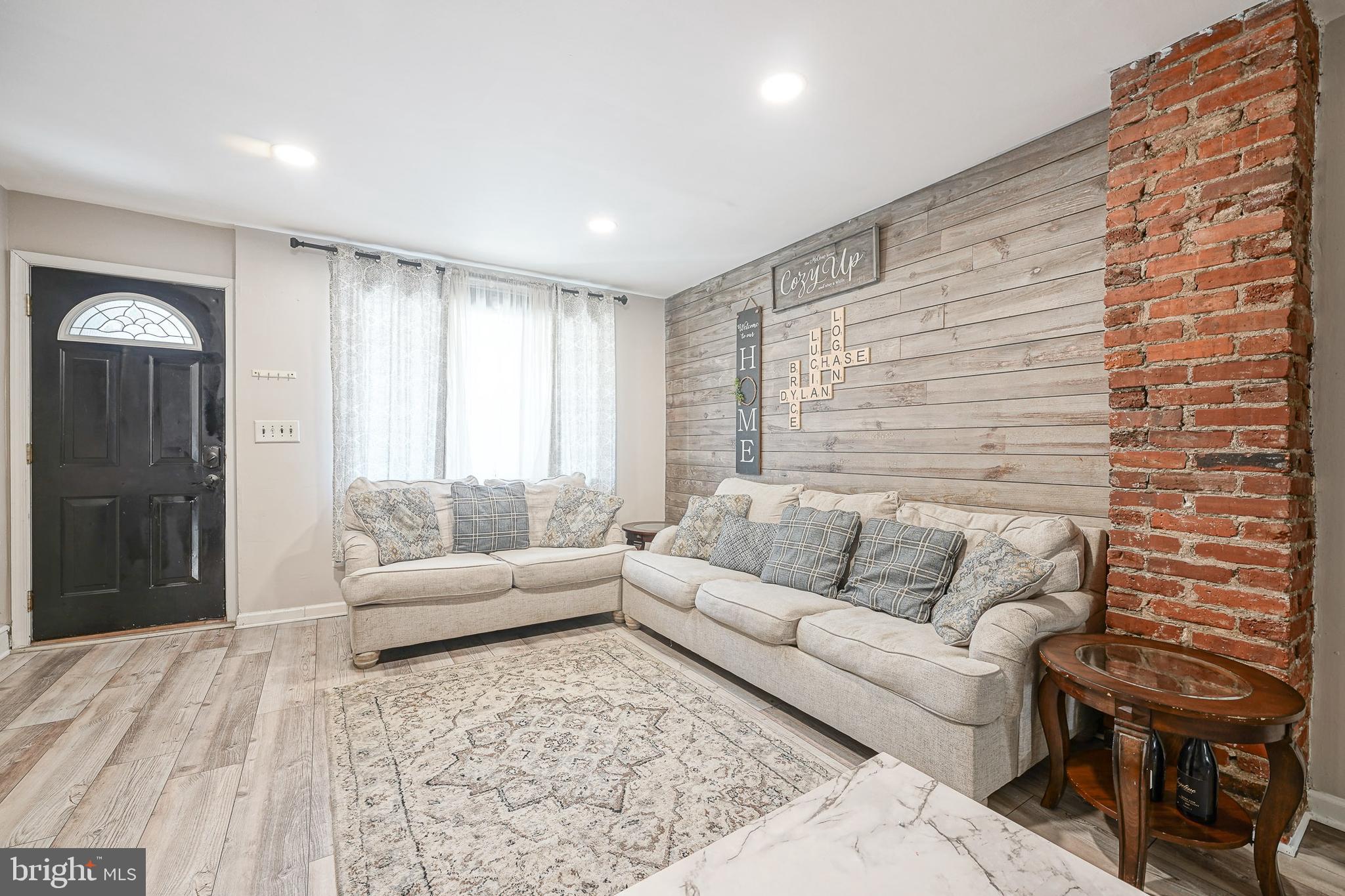 a living room with furniture and a couch