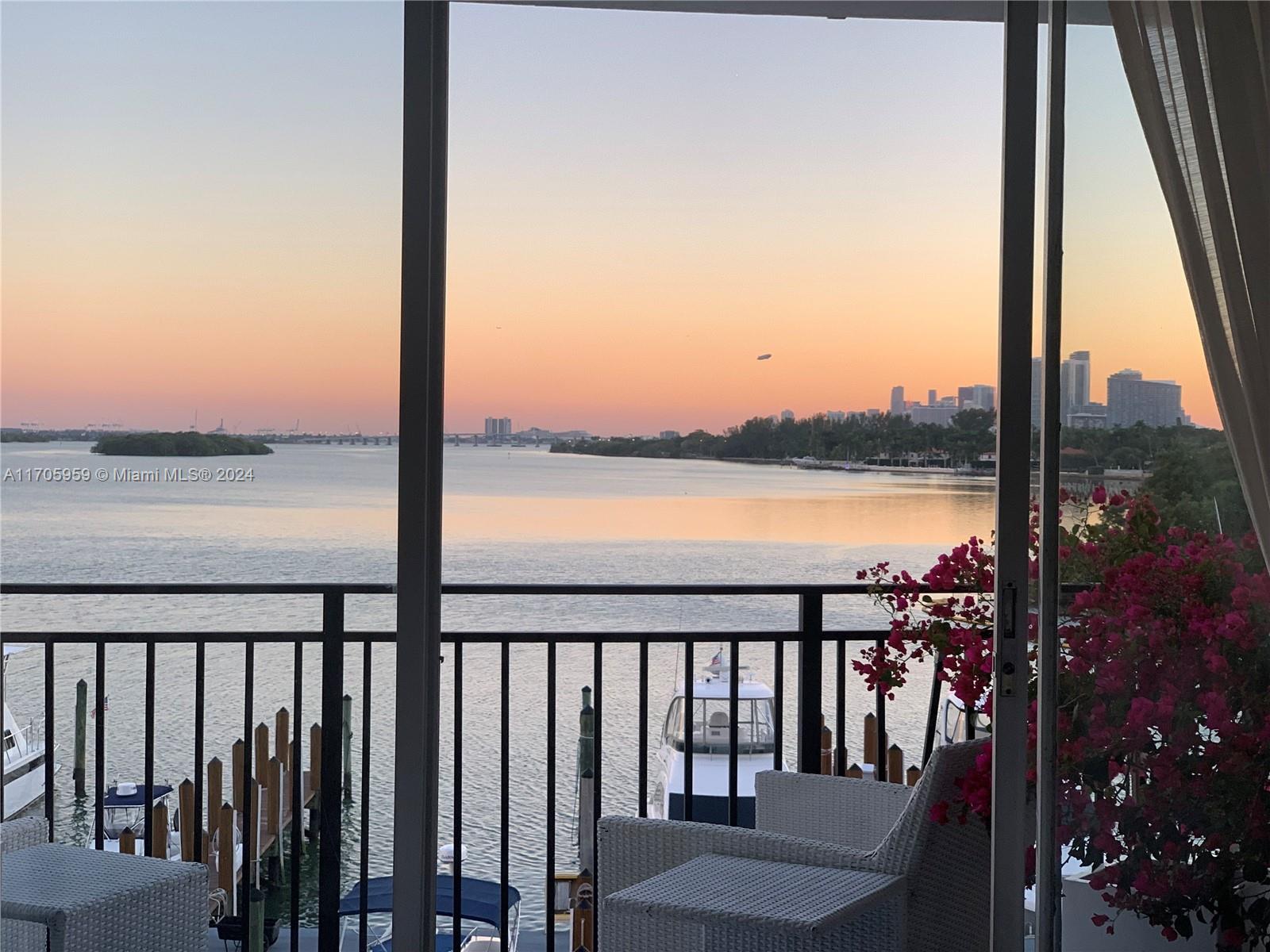 a view of a balcony with an ocean view