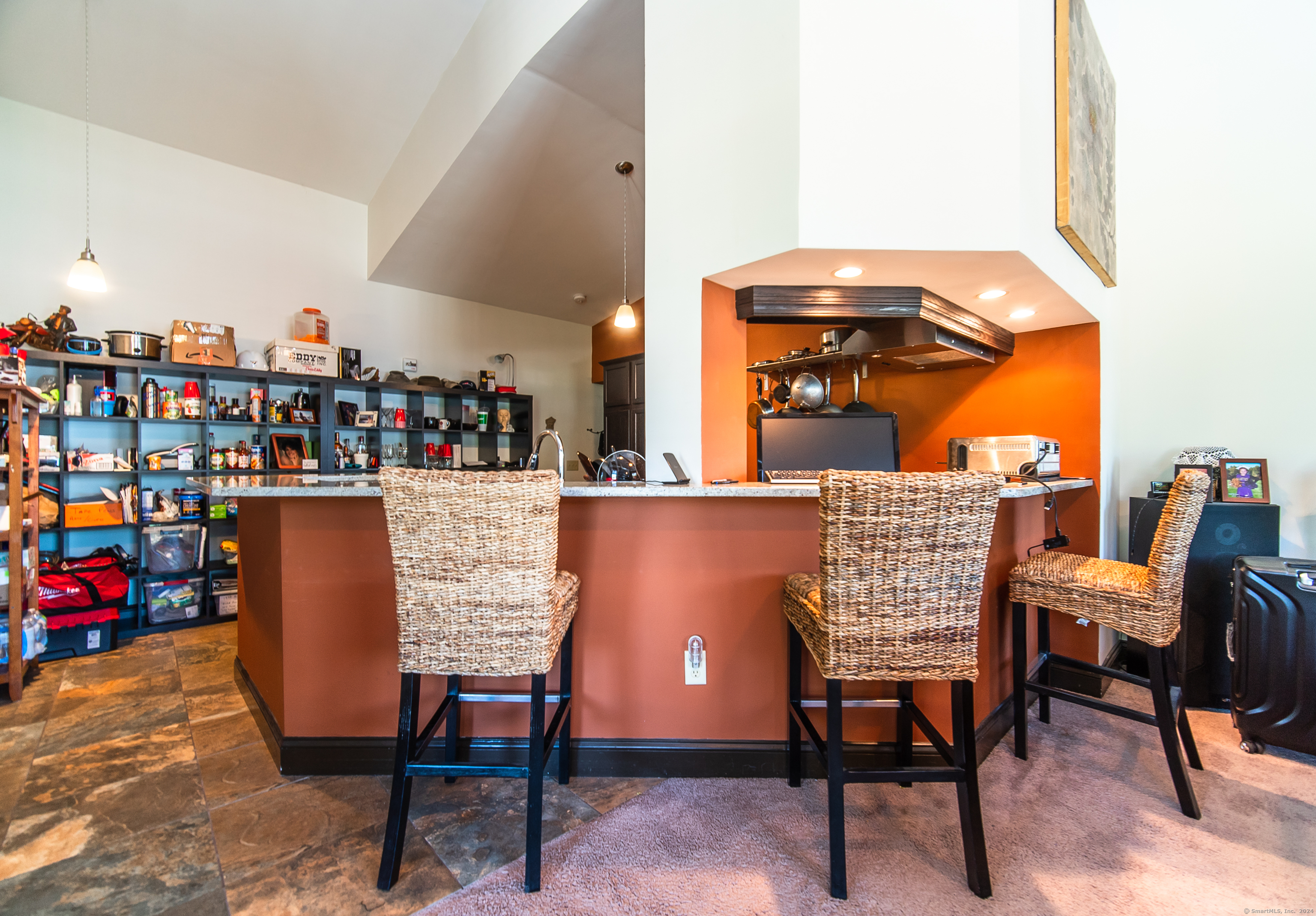 a dining room with furniture and a table