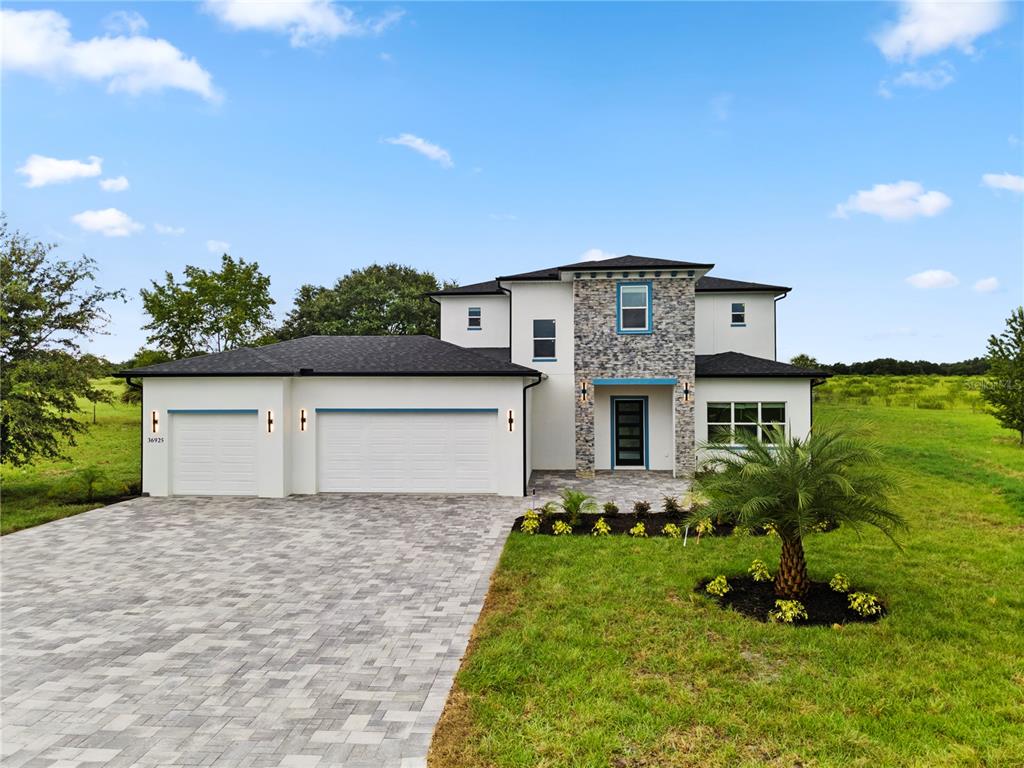 a front view of house with yard