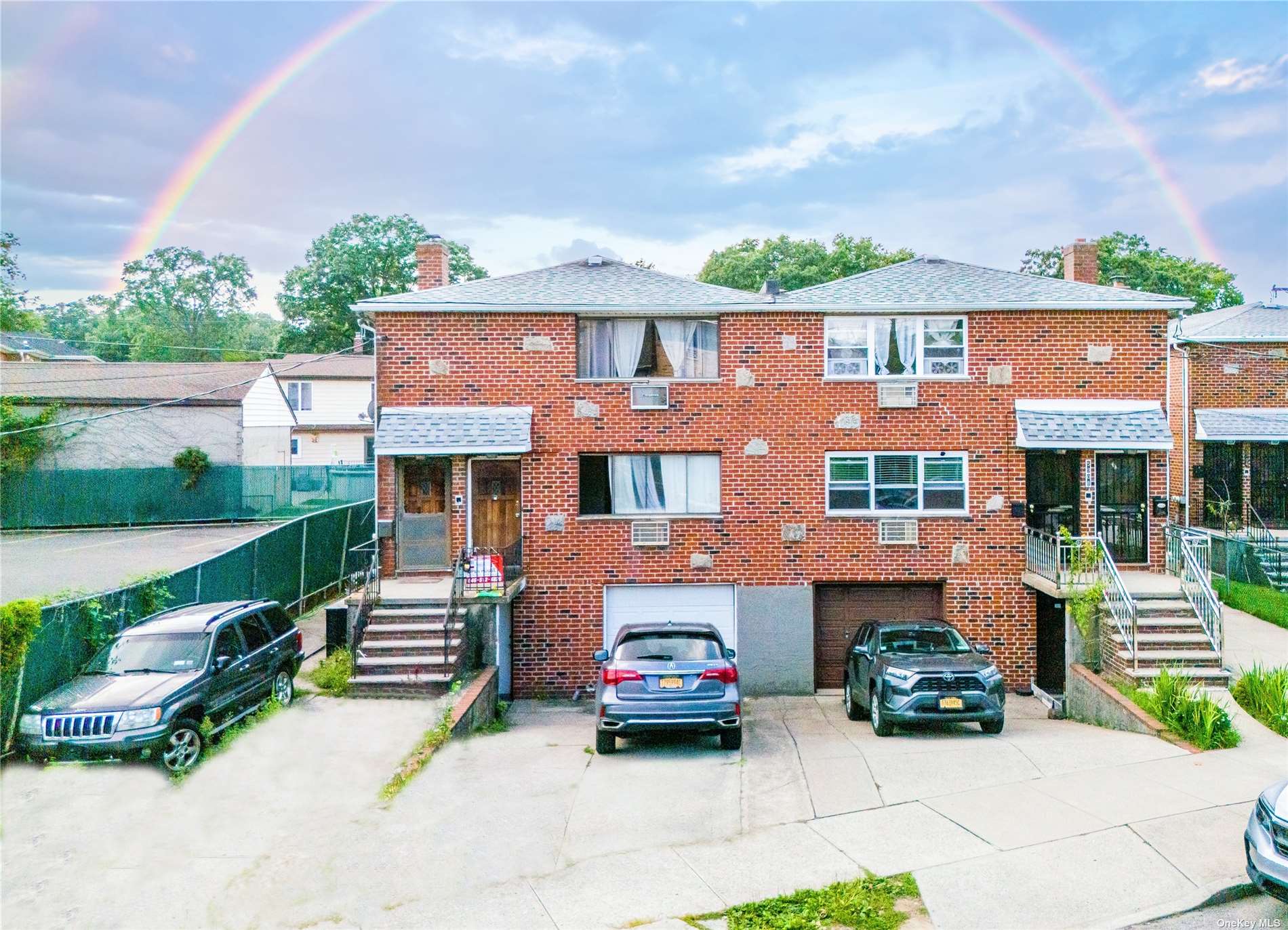 an aerial view of a house with a garden and balcony