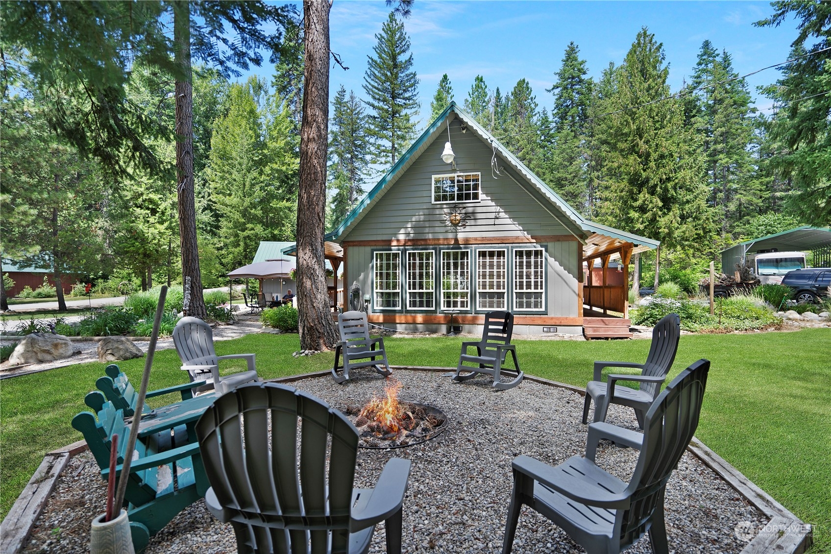 a view of a house with a yard porch and sitting area