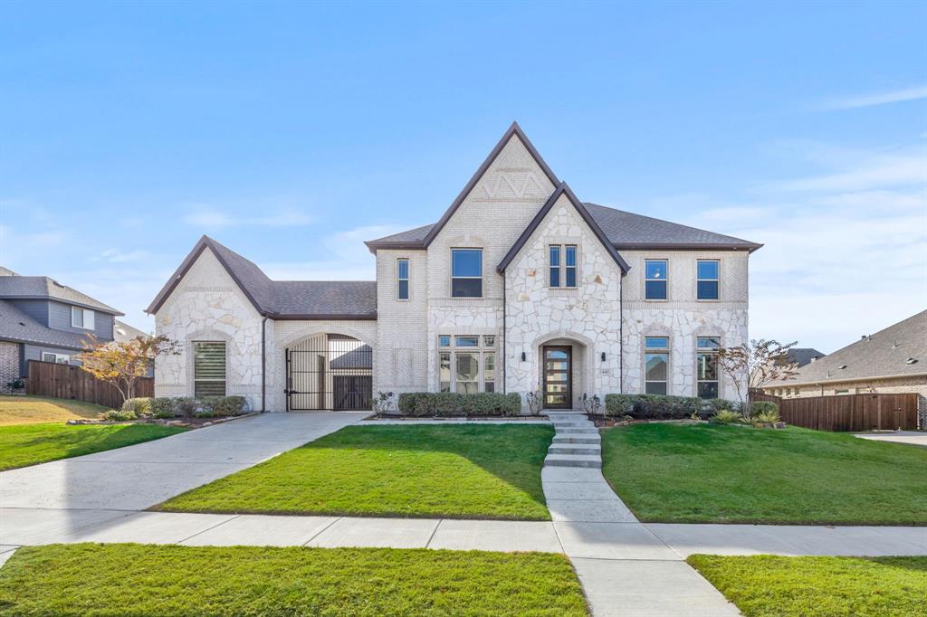 View of front of house featuring a front lawn