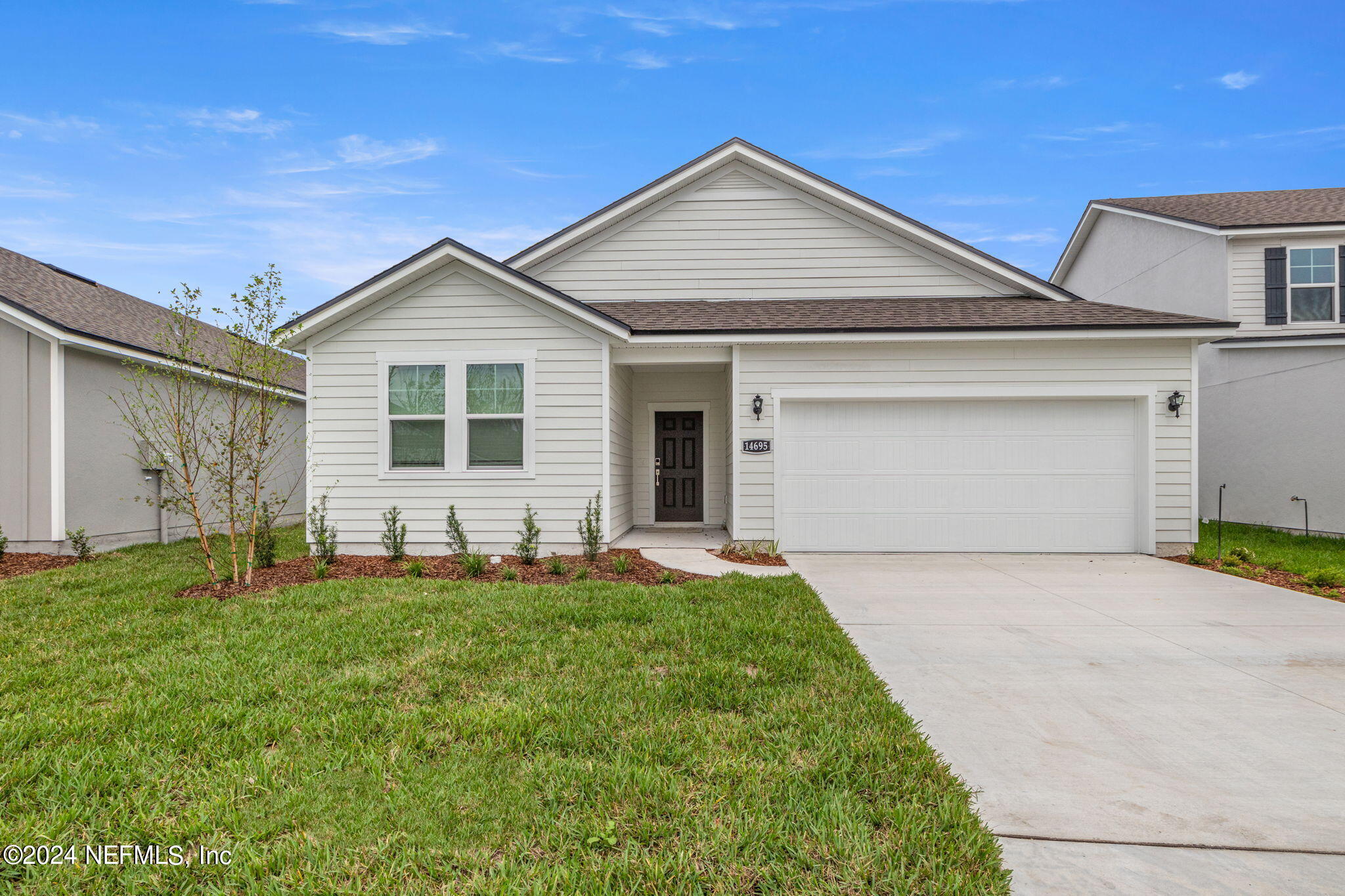 a front view of house with yard