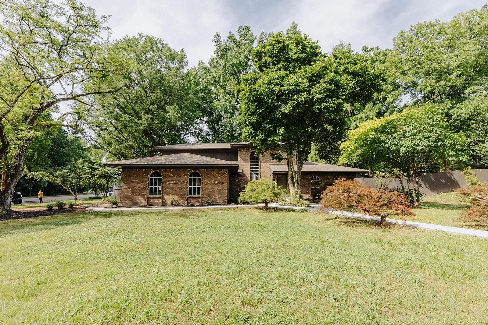 View of front of property with a front yard