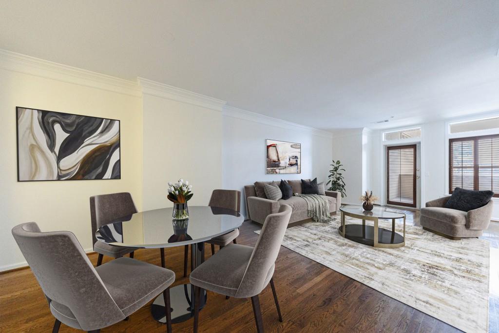 a dining room with furniture and wooden floor