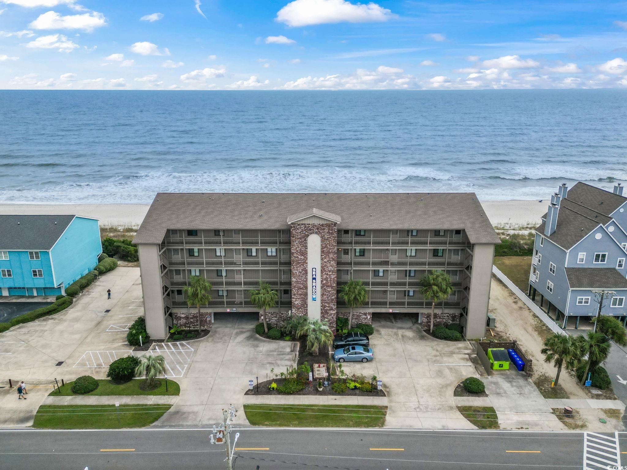 Drone / aerial view with a view of the beach and a