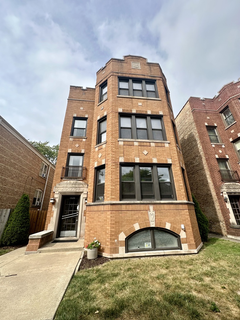 a front view of a multi story residential apartment building