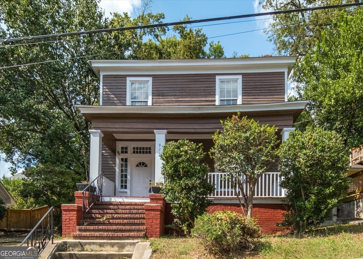 front view of a house with a small yard