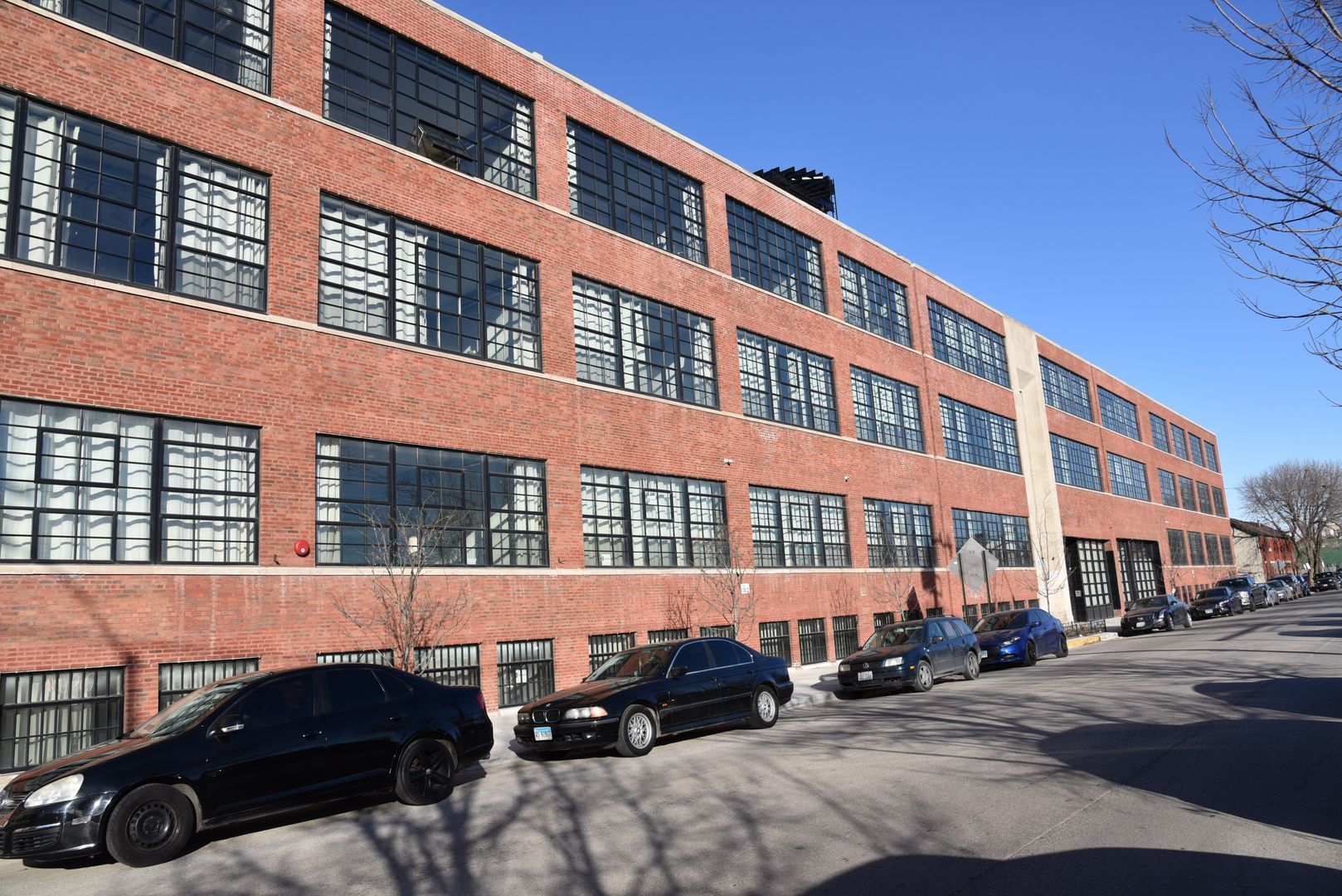 a front view of a building with street view