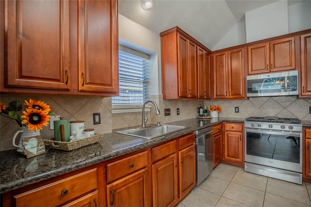 Holiday memories are ready to be made in this beautifully updated kitchen. Gas range and microwave are recent.