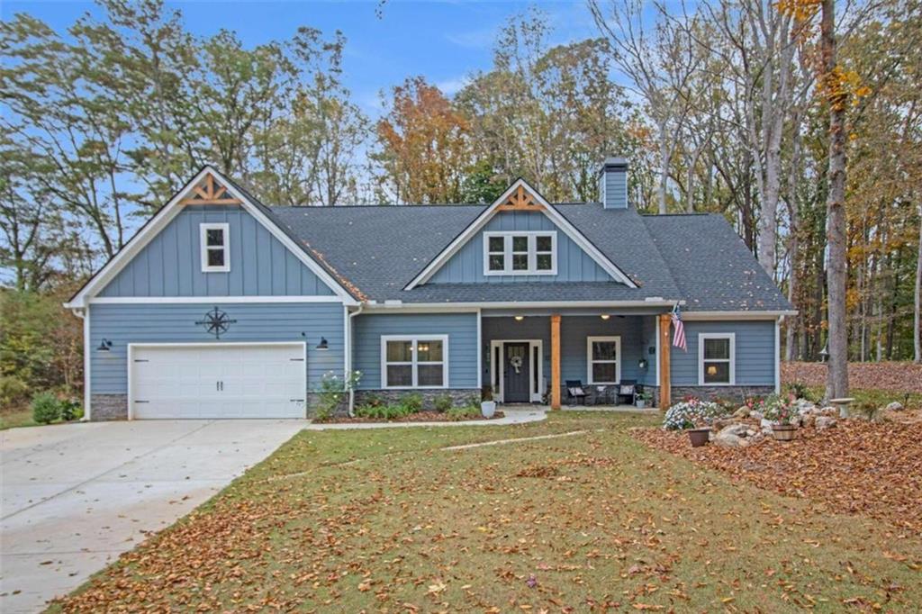 front view of a house with a yard