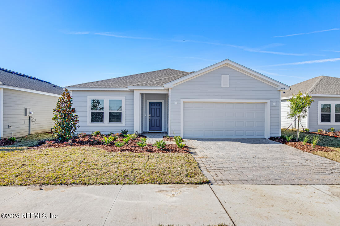 a front view of house with yard