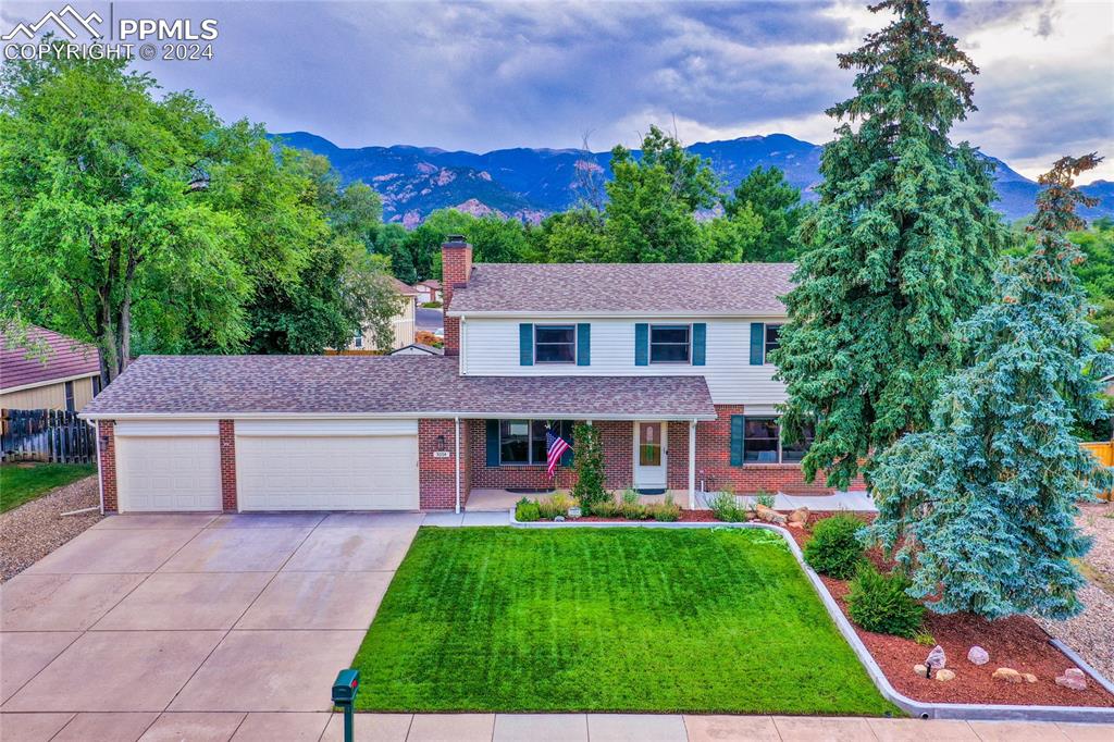 a house view with a garden space