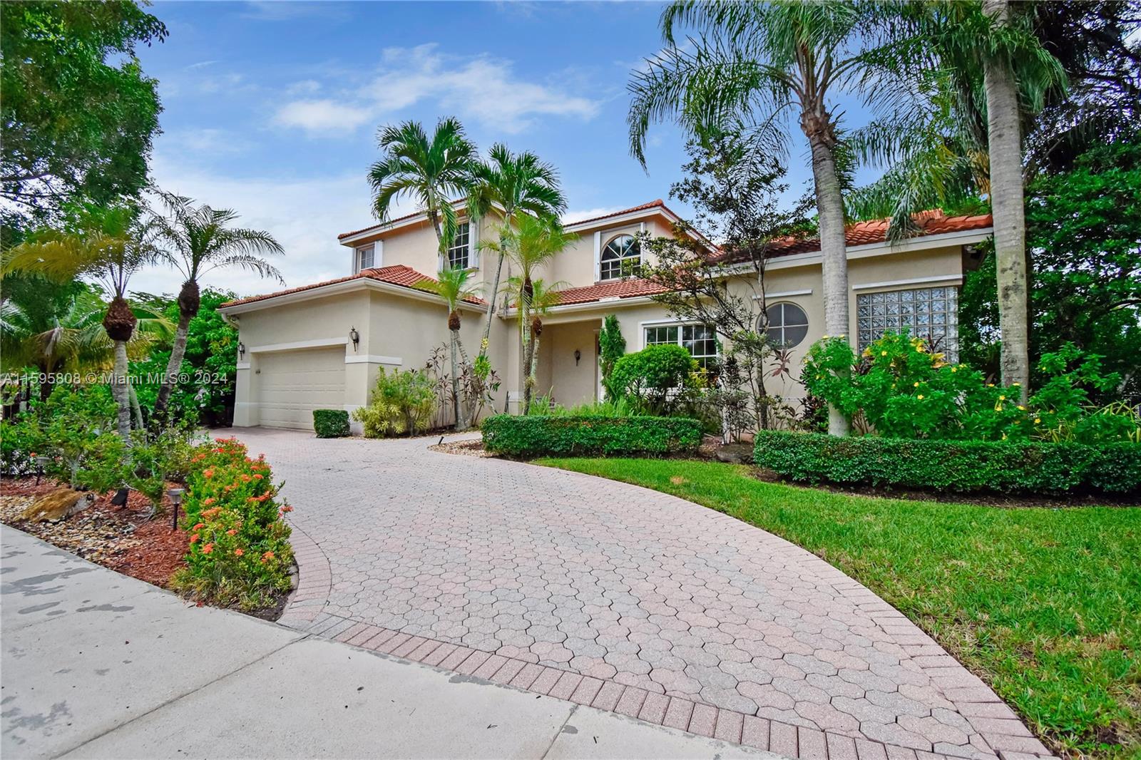 front view of a house with a garden