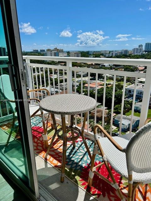 a view of a chairs and table in a terrace