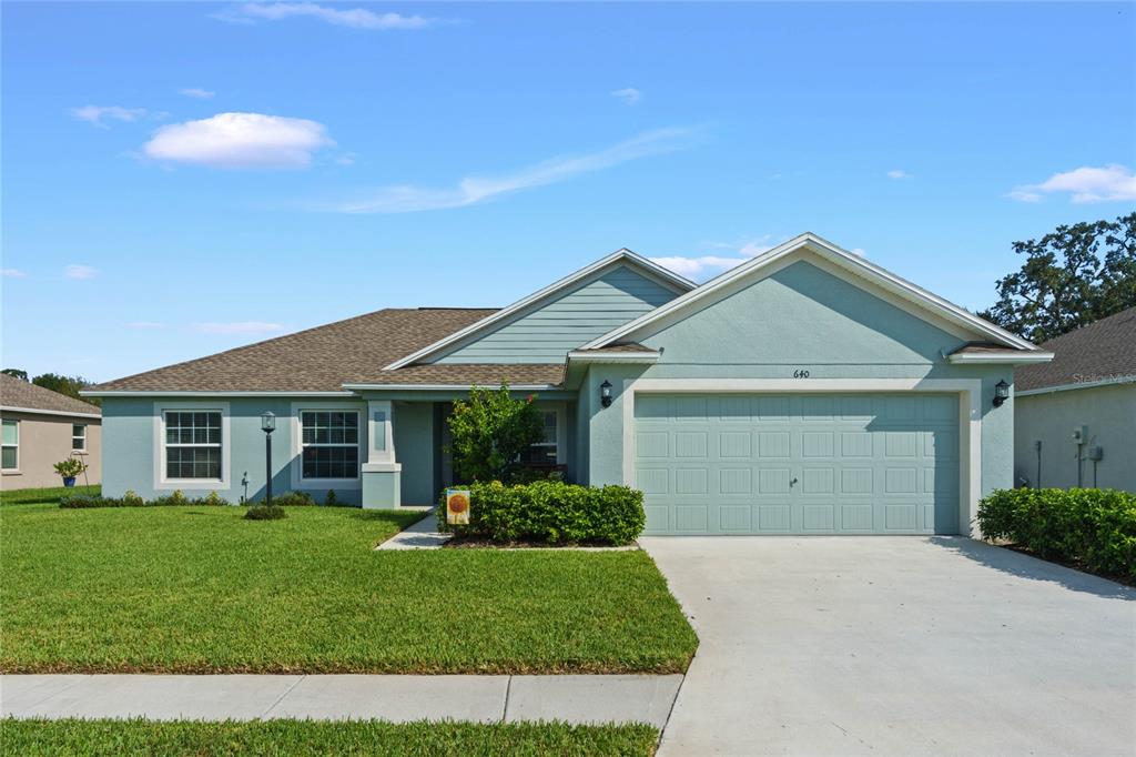 a view of outdoor space yard and front view of a house