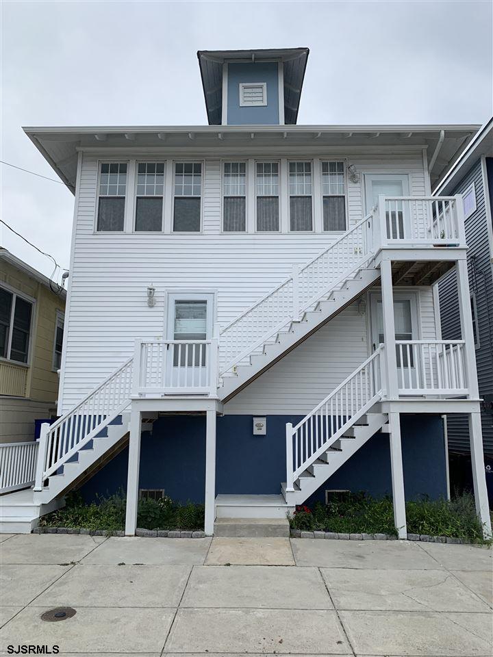 a front view of a house with balcony