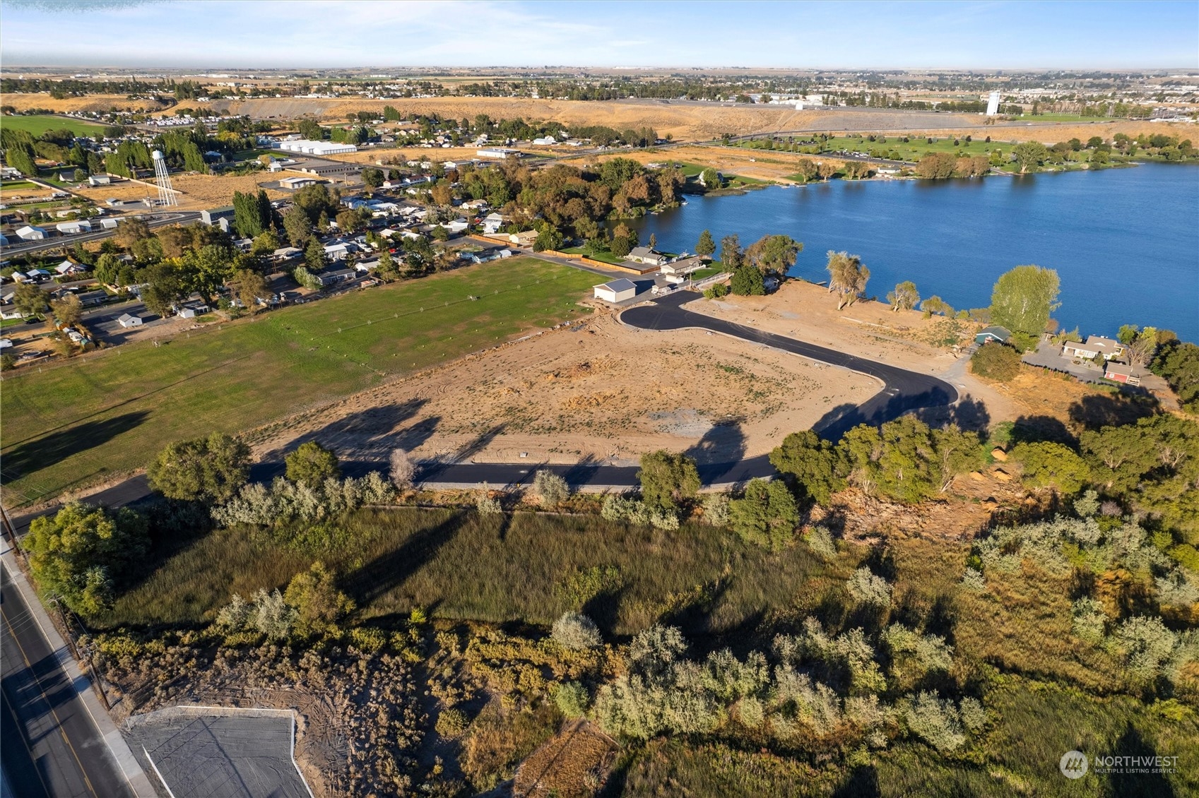 an aerial view of a houses with outdoor space