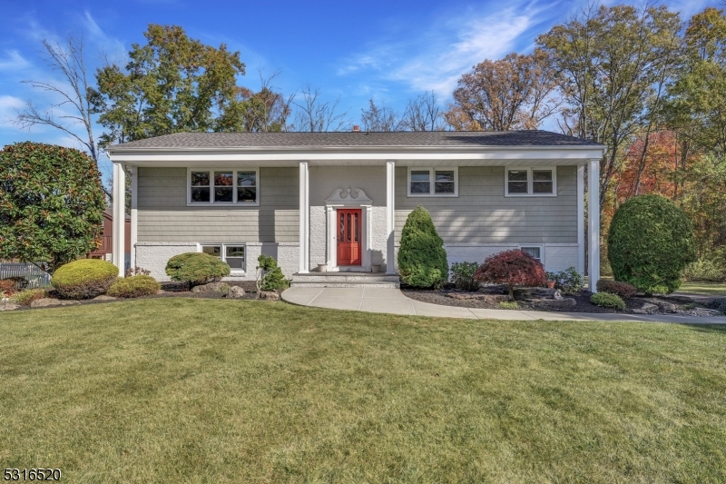 front view of a house with a patio