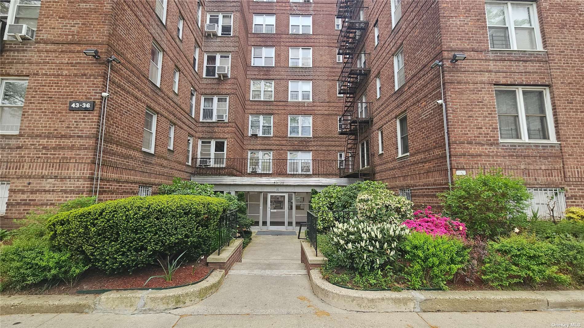 a front view of a multi story residential apartment building