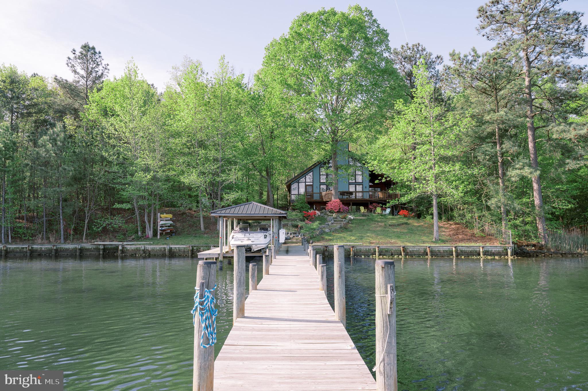 a house view with a lake view