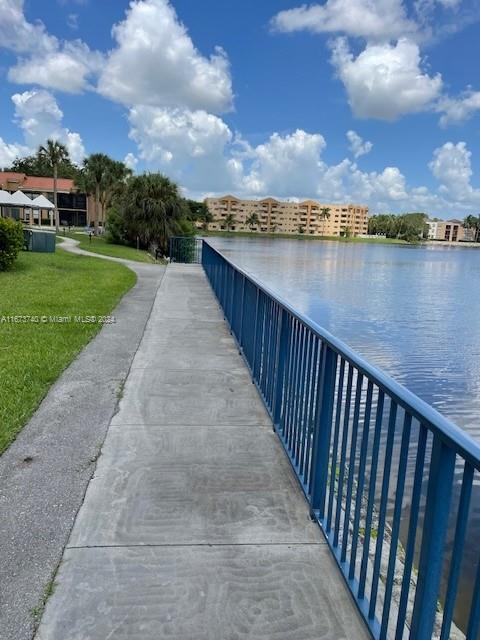 a view of a lake with a city