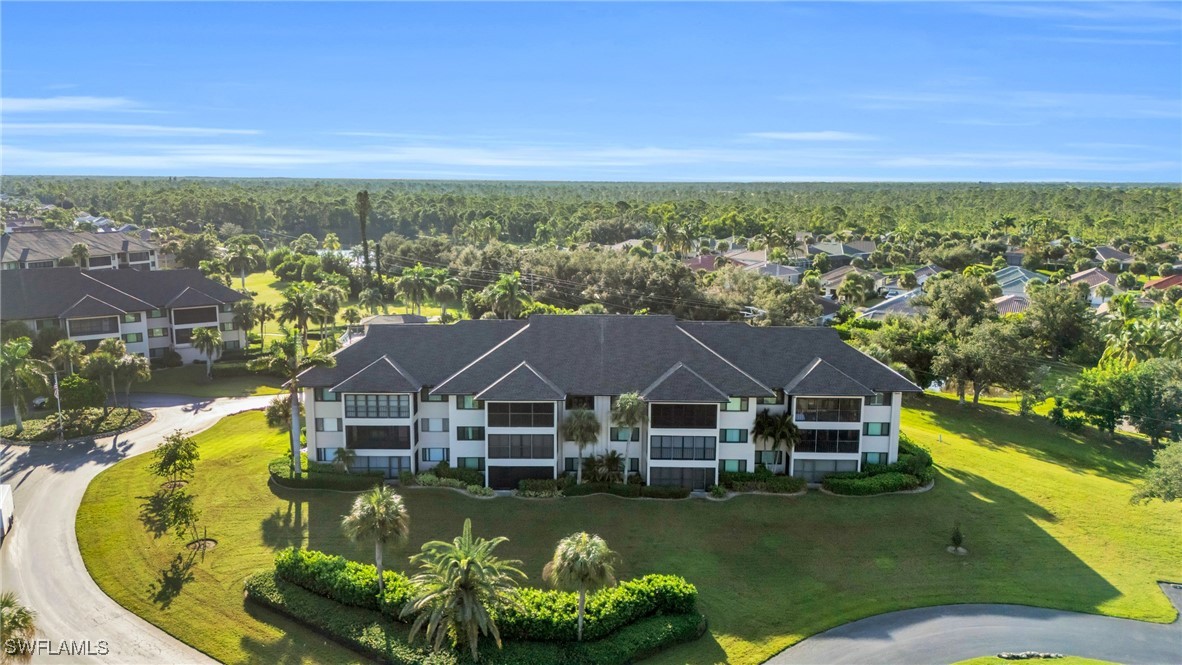 a aerial view of a house with swimming pool