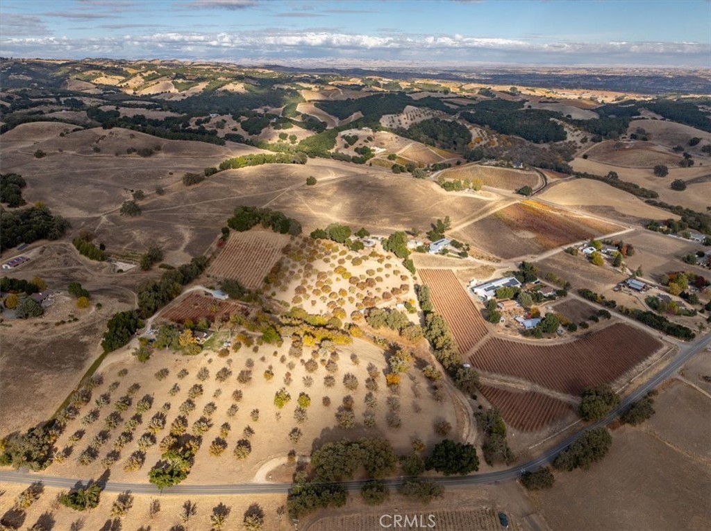 an aerial view of grey house