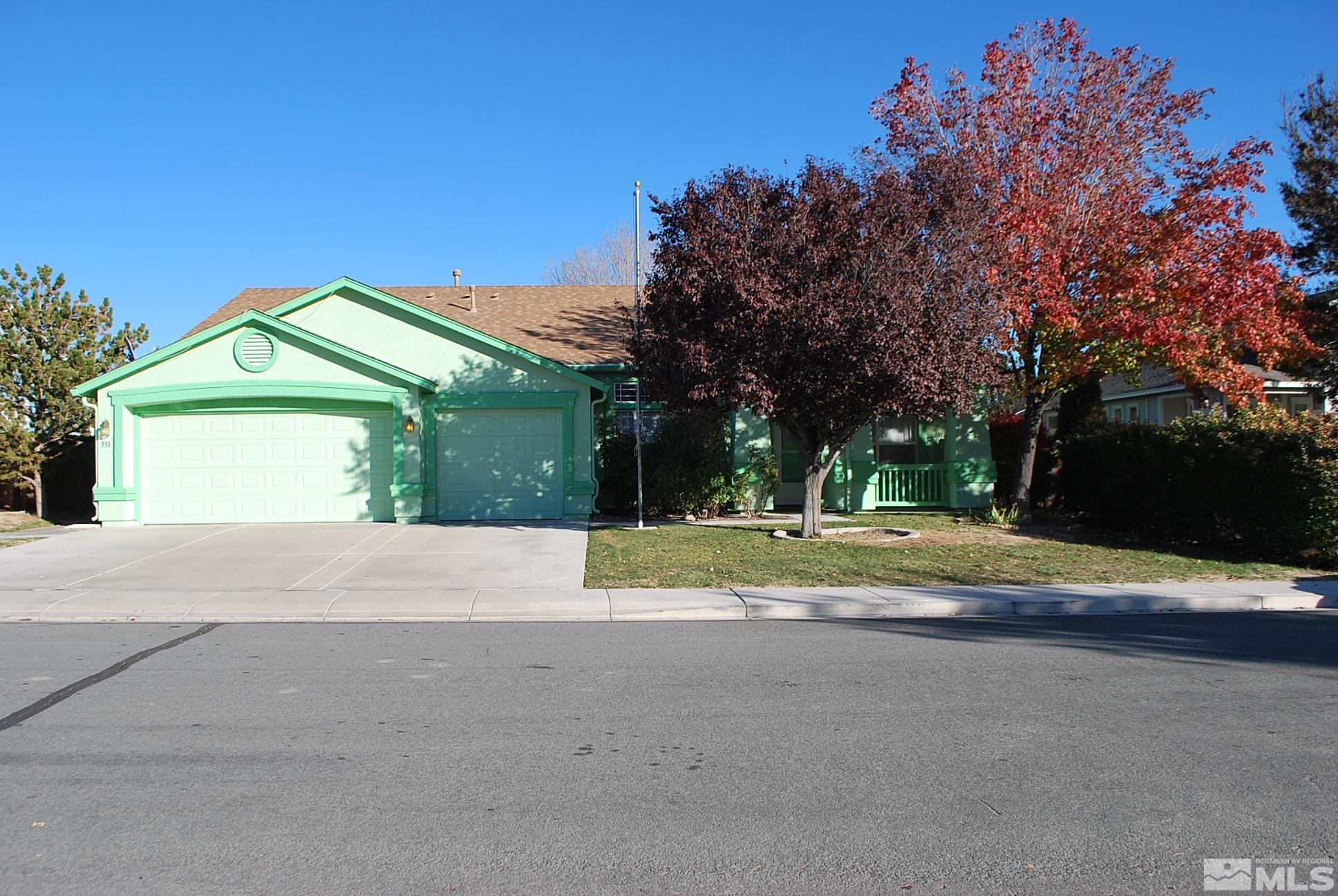 a house with trees in the background