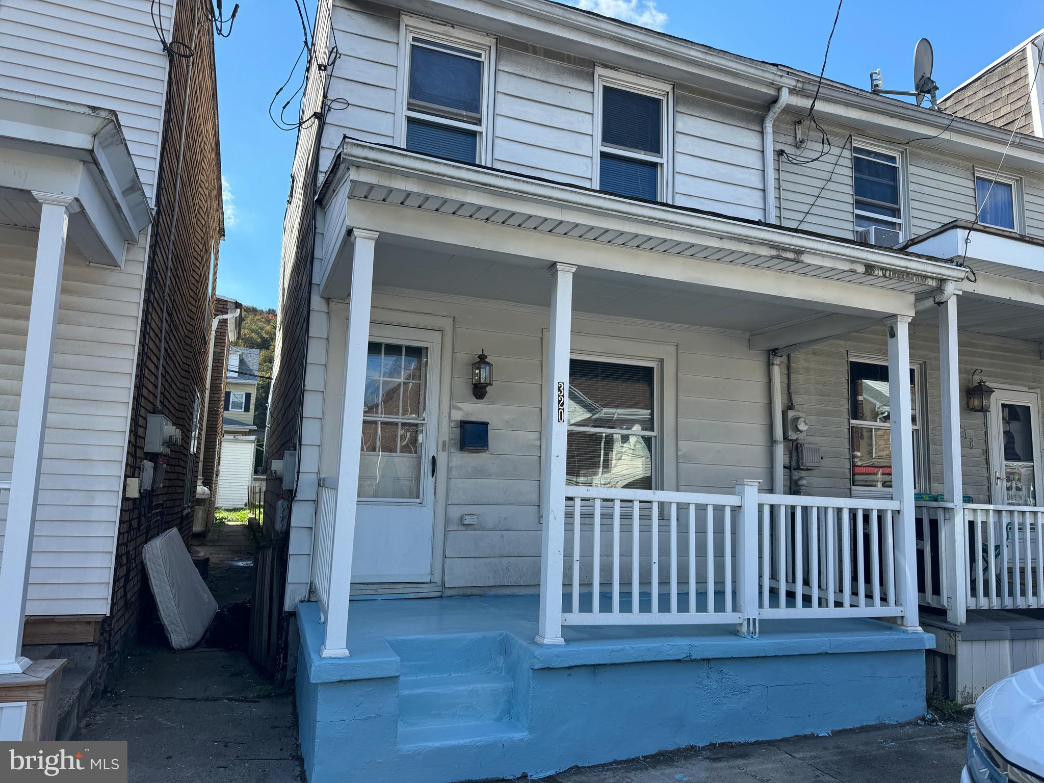 a view of a house with a porch