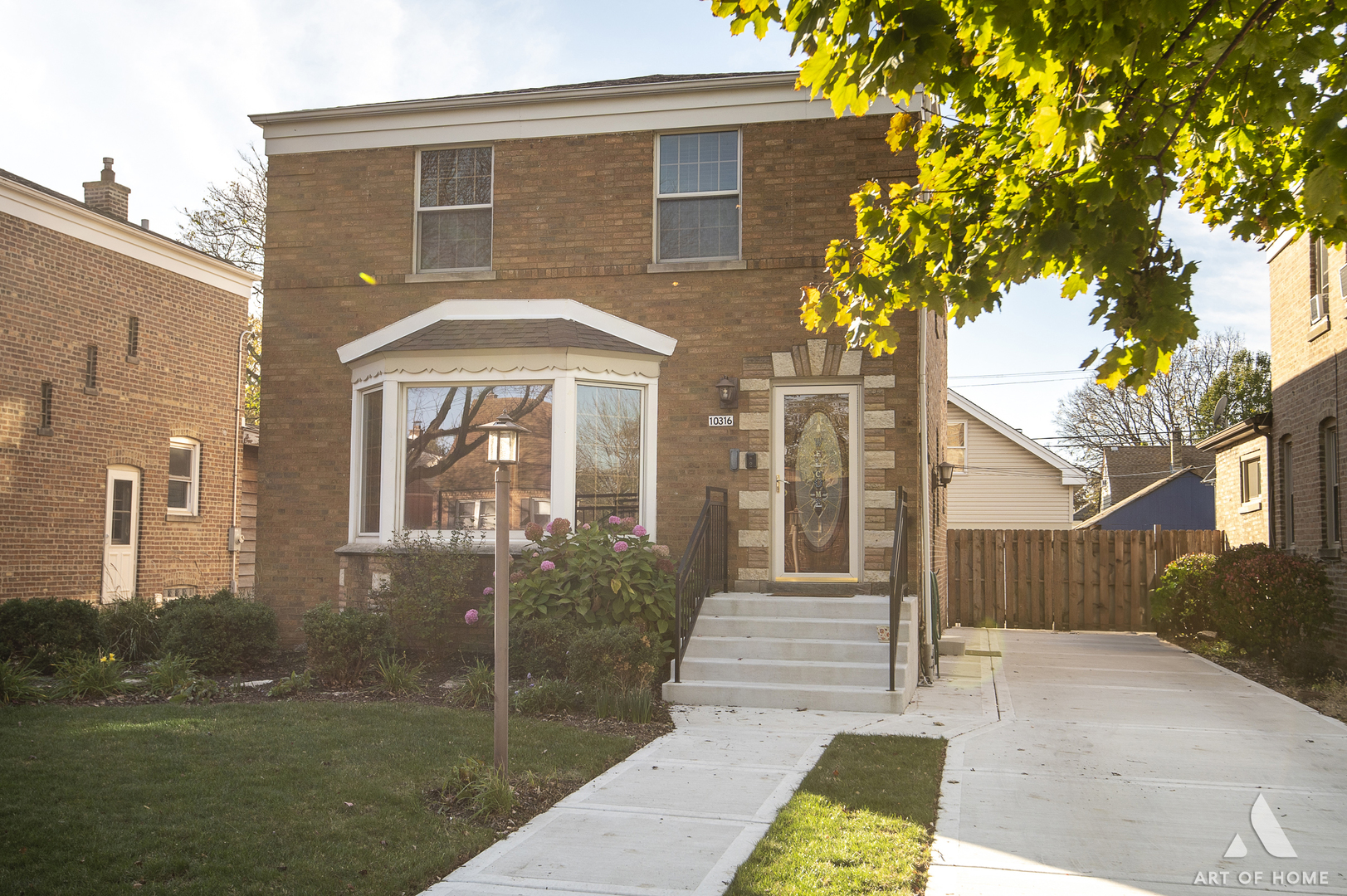 a front view of a house with a porch