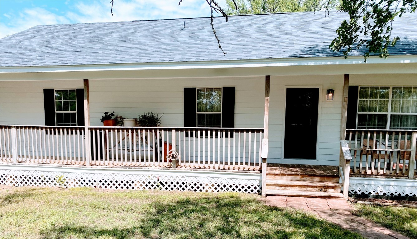 a porch with a bench