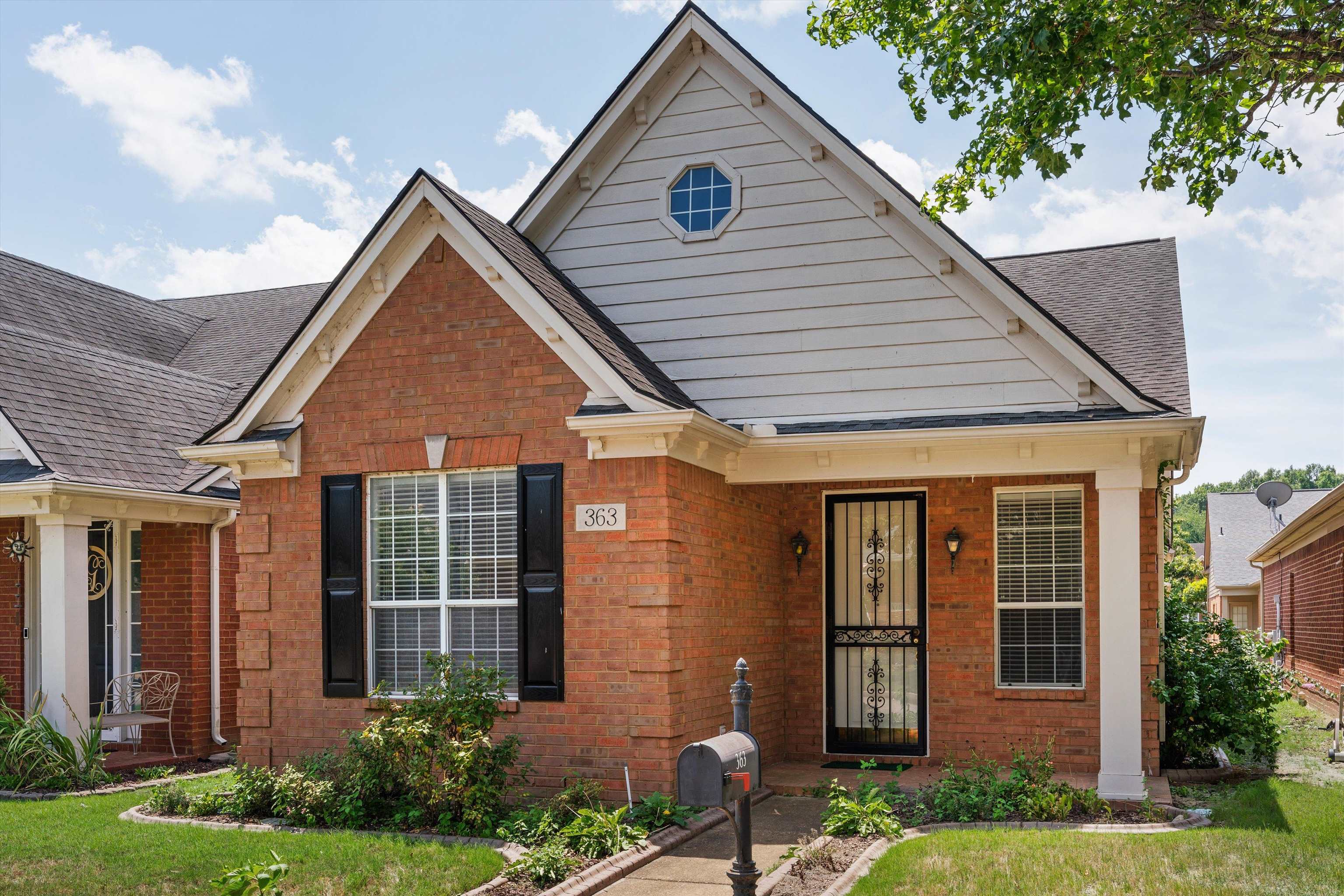 View of front of house with a front yard