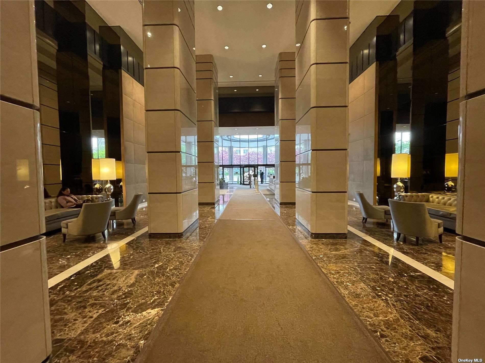 a view of a lobby with black carpet