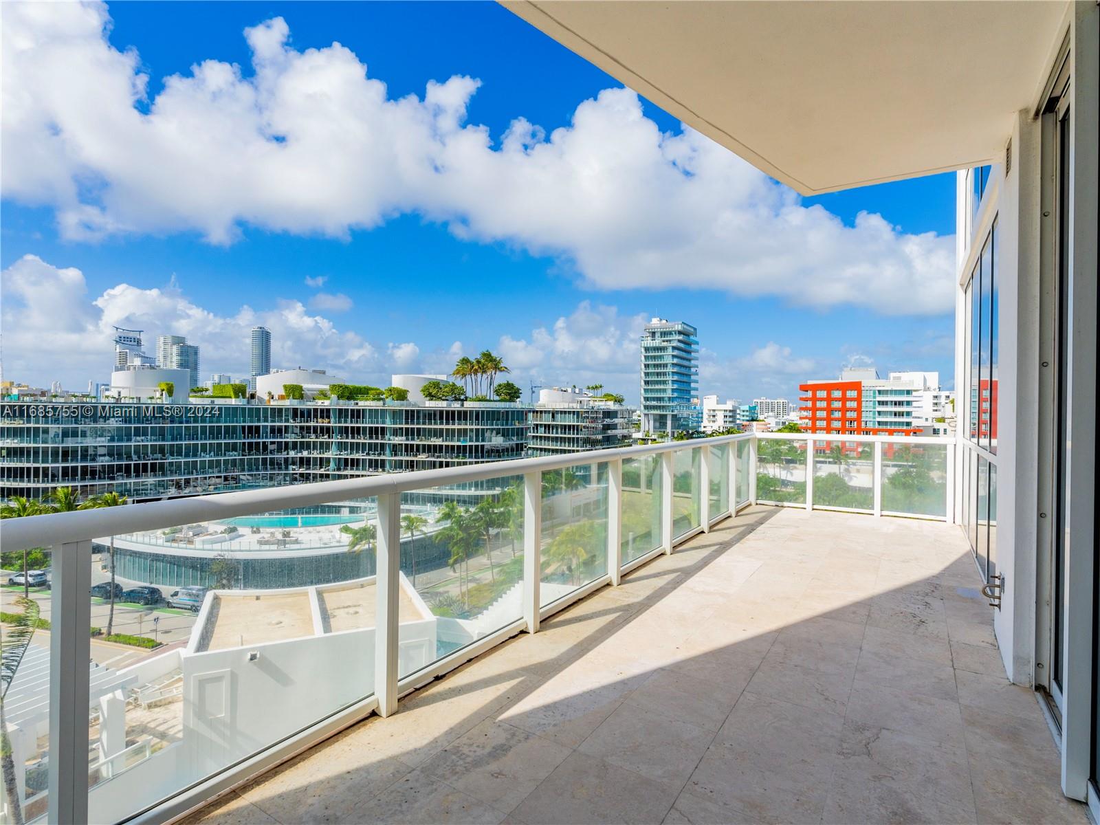 a view of a balcony with city view