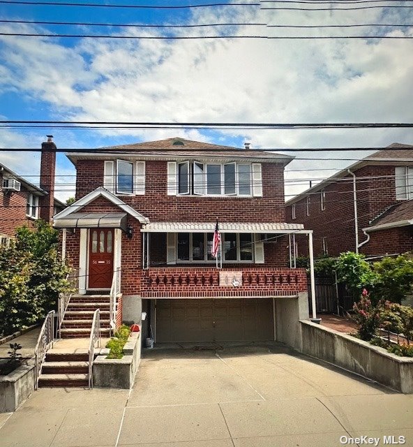 a front view of building with an entrance