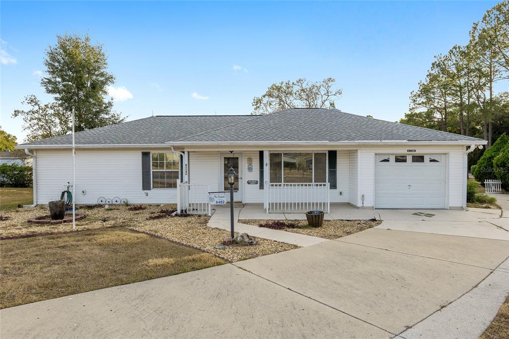 a front view of a house with a patio