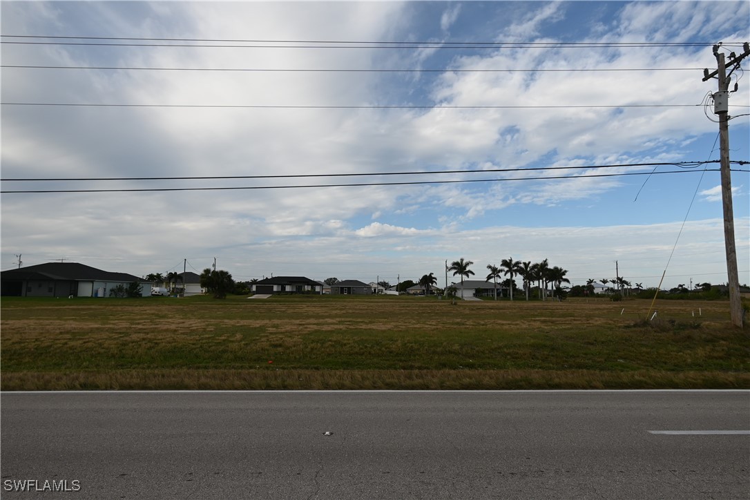 a view of a lake with a big yard