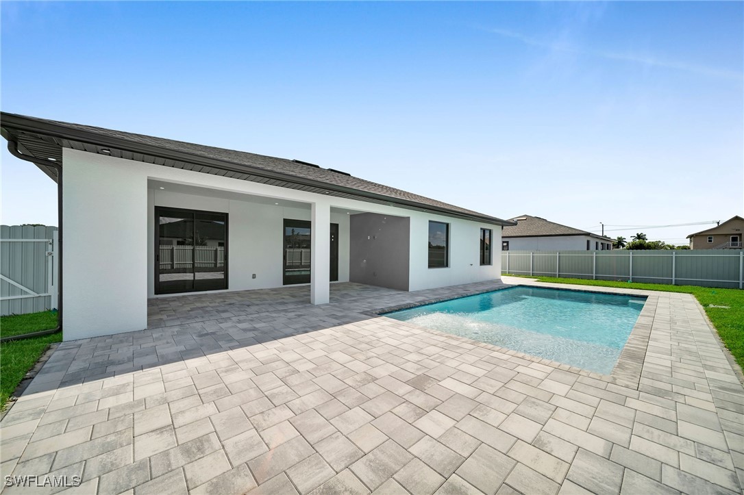 a house view with a backyard space