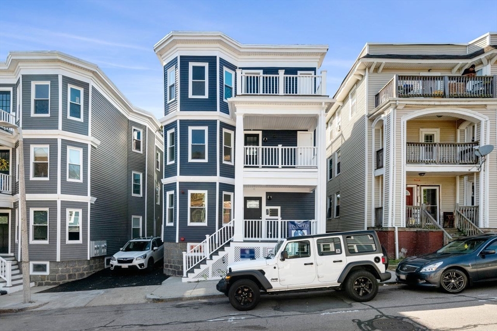 a car parked in front of a building