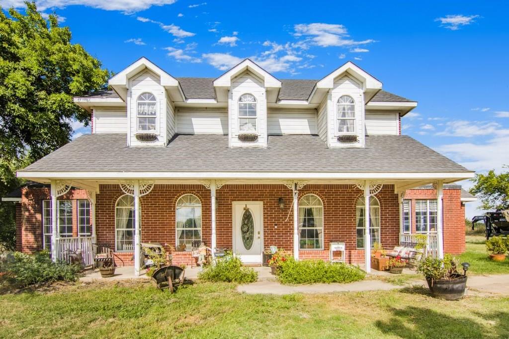 front view of house with a yard