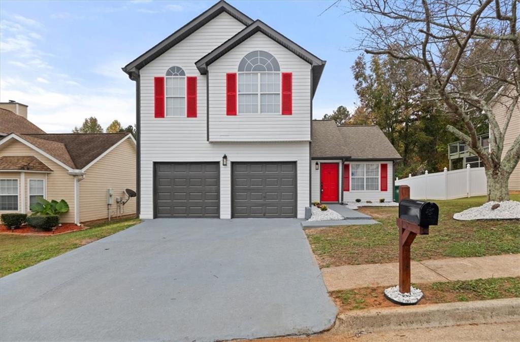 a front view of house with yard