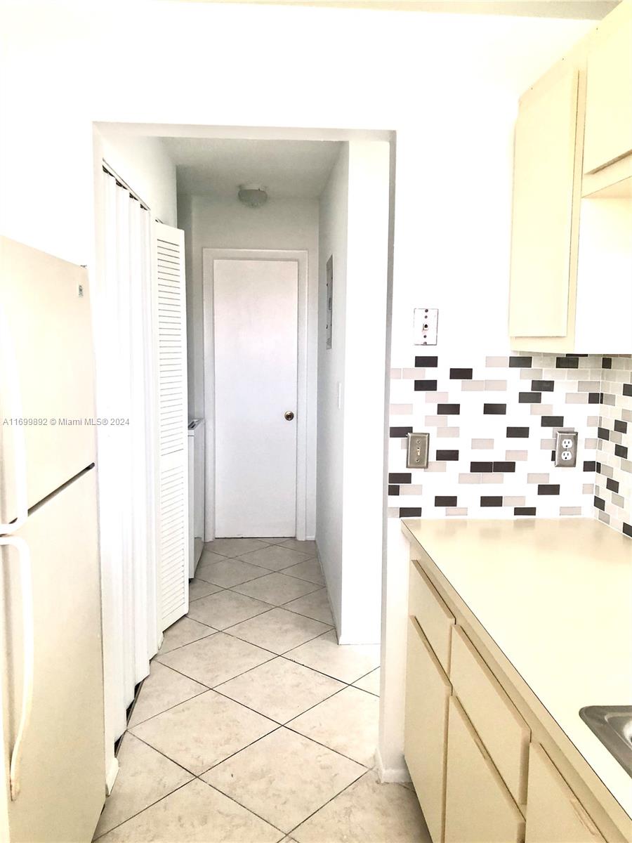 a view of a kitchen with a sink