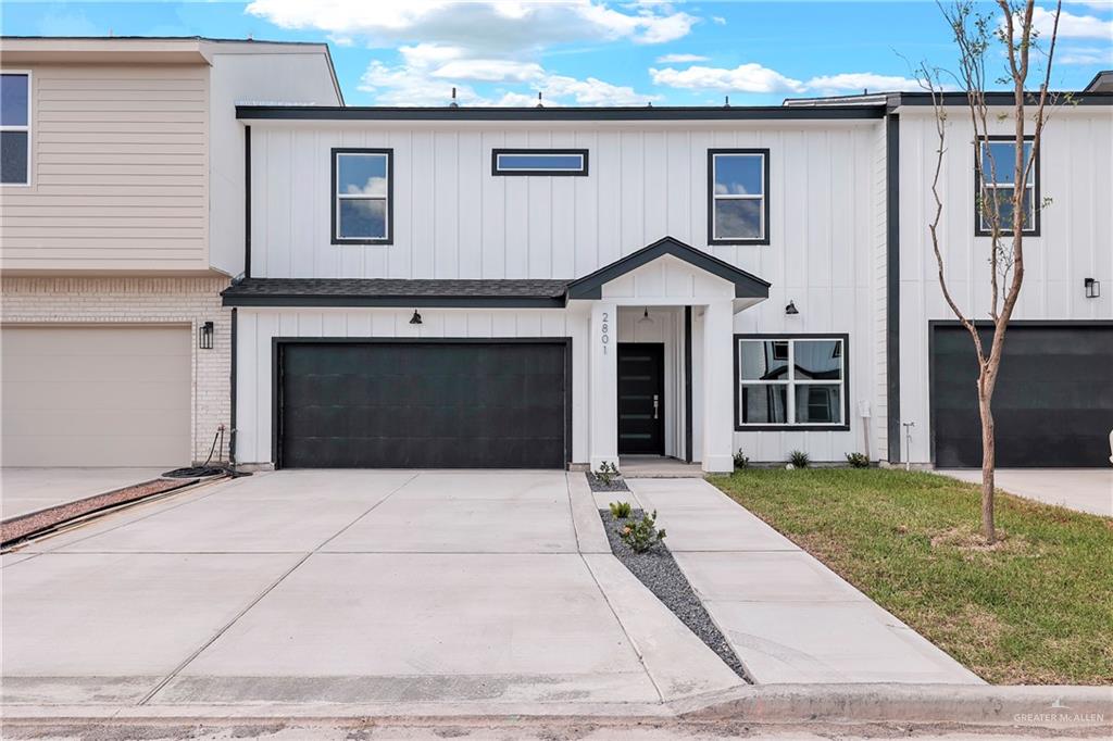 View of front of home featuring a garage