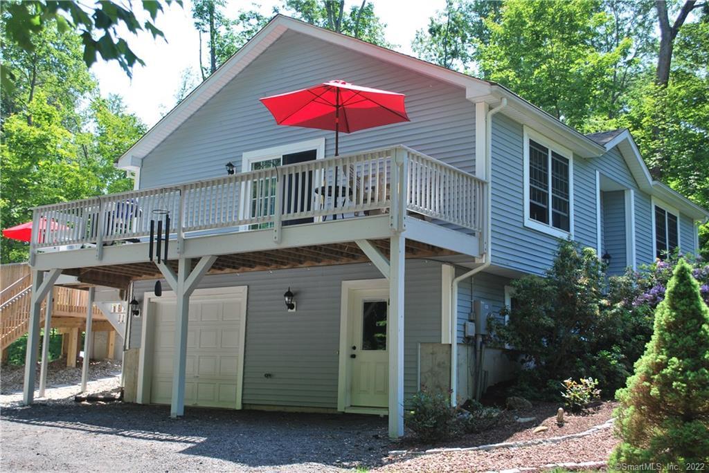 a front view of a house with yard