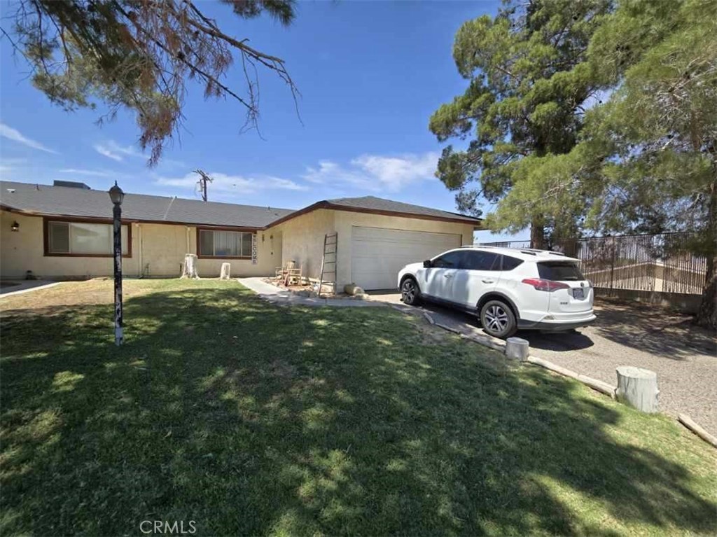 a house view with a garden space