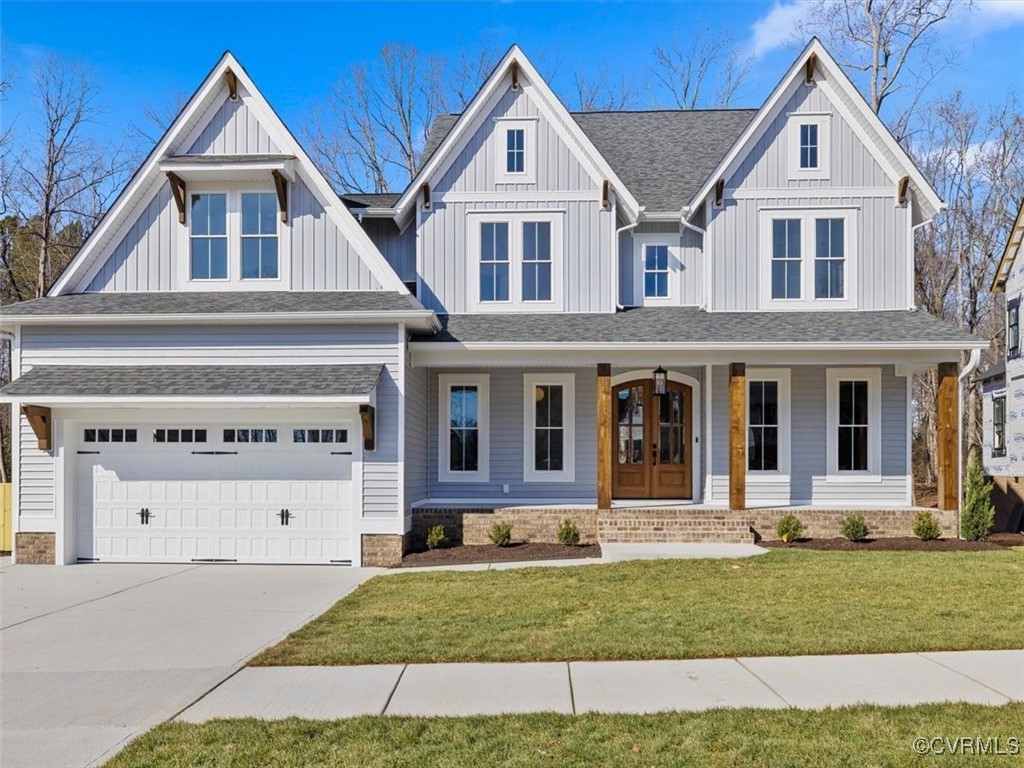 front view of a house with a yard