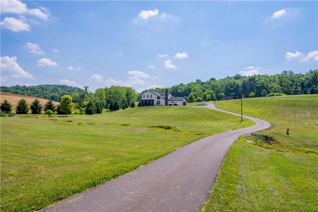 a view of a golf course with a lake